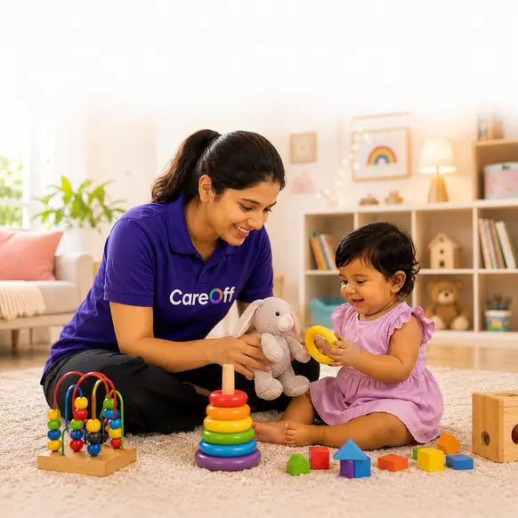CareOff verified babysitter playing with baby at home in Hyderabad