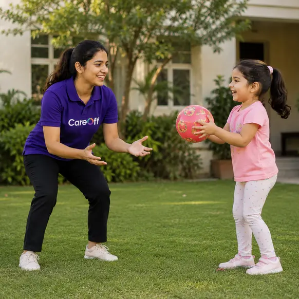 CareOff child care companion playing ball with a young girl in a garden in Bengaluru